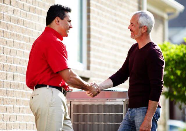 Tech And Homeowner Shaking Hands Mobile Tech And Homeowner Shaking Hands Mobile